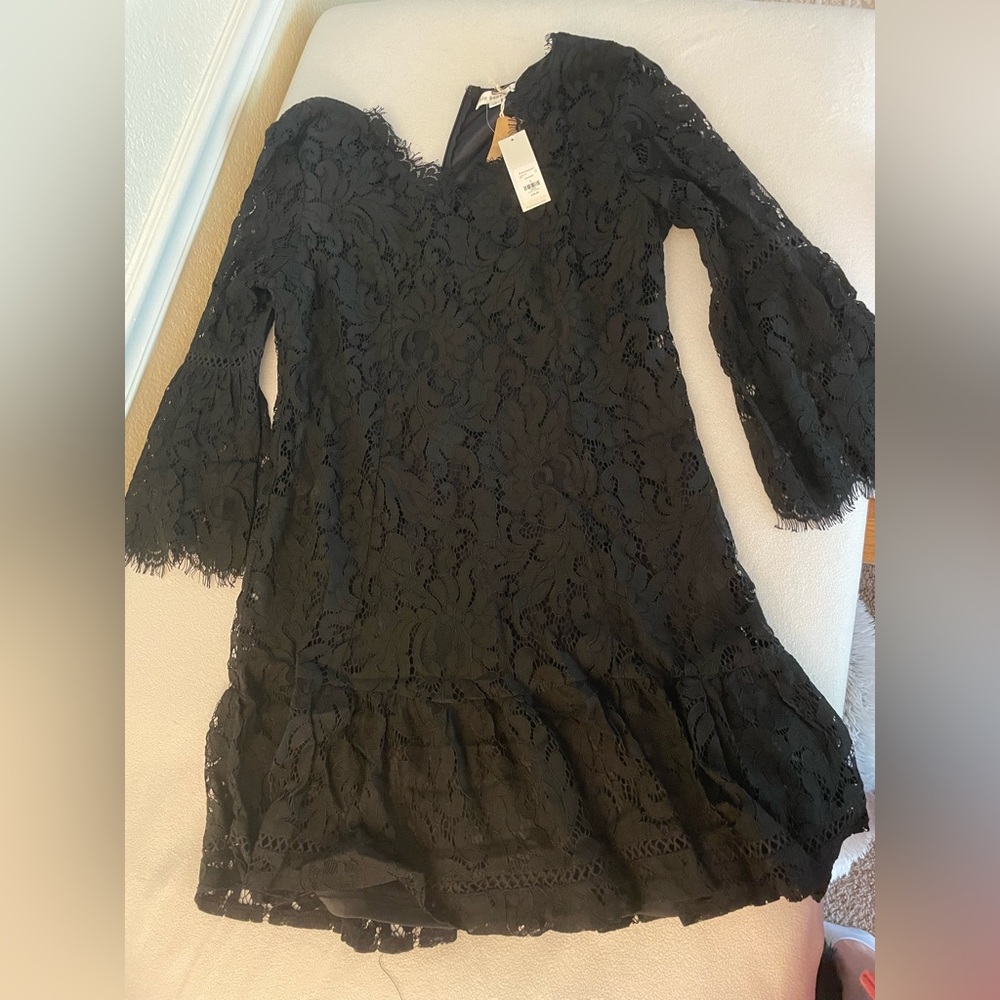 Black long sleeve lace dress.